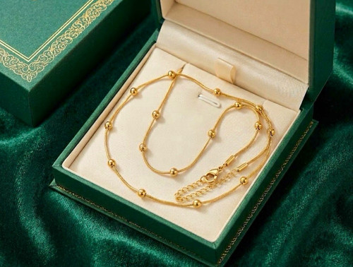 Gold tone snake - gold, beaded